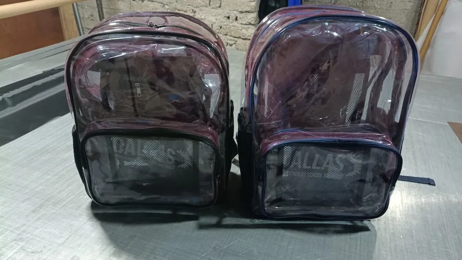Mochila transparente de PVC con bolsillo frontal al mayoreo